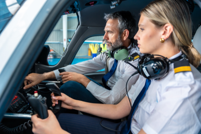 Pilot receiving guidance during training