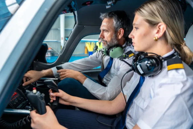 Pilot receiving guidance during training