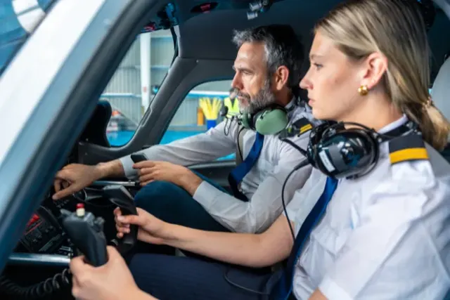 Student and advisor planning a pilot training route