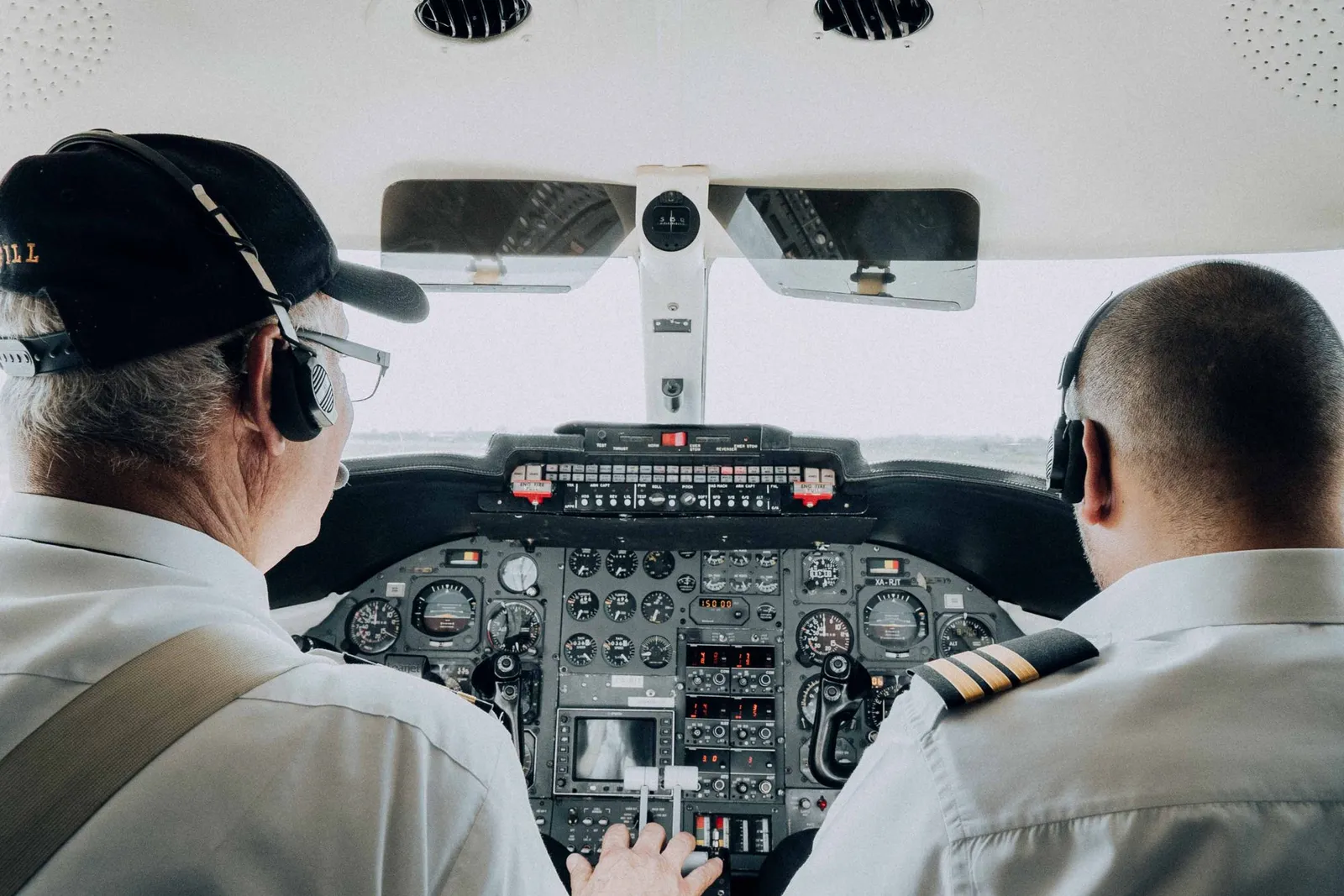 Two airline pilots on the flight deck