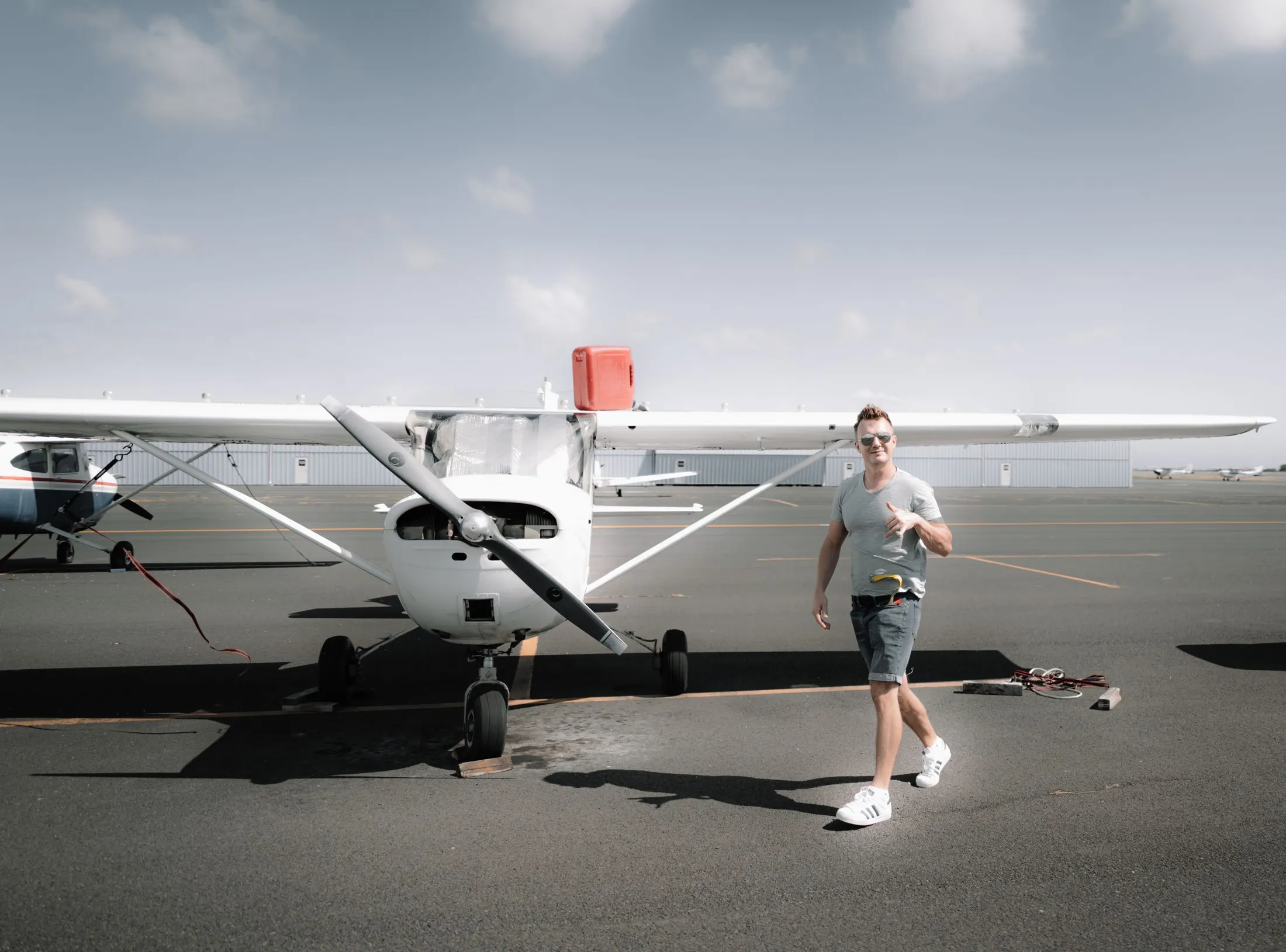 Light training aircraft on a grass airfield
