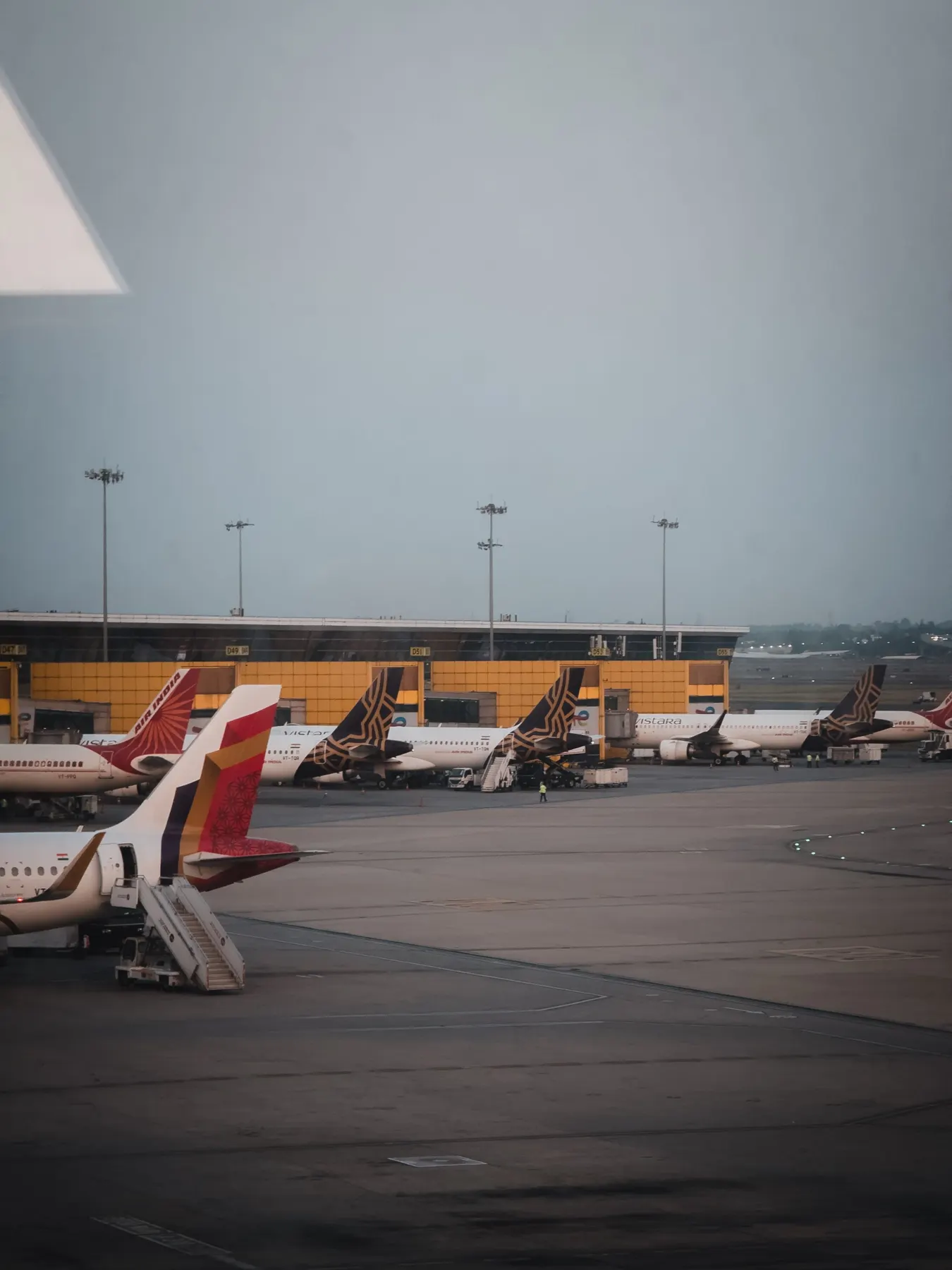 Airliners parked on an airport apron