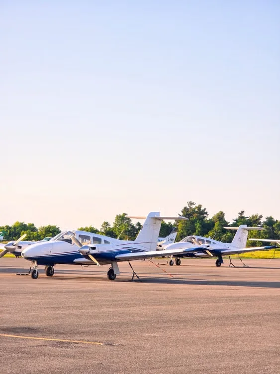 Training aircraft lined up on the apron
