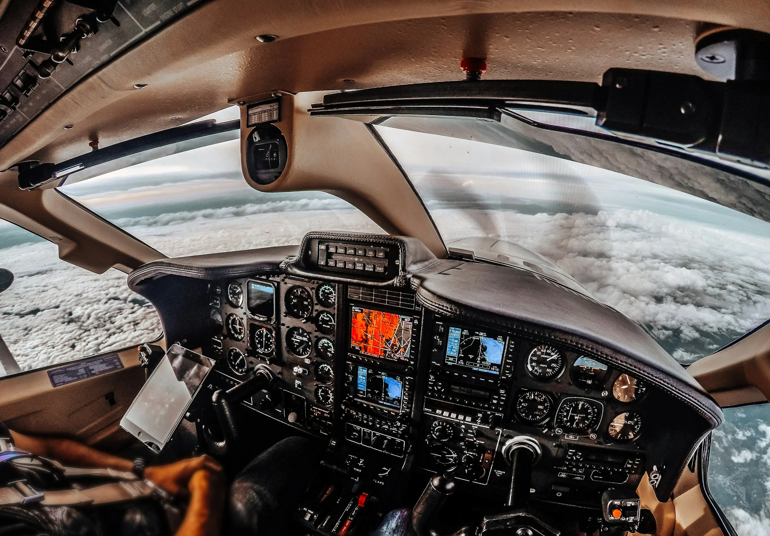 Light training aircraft cockpit in flight
