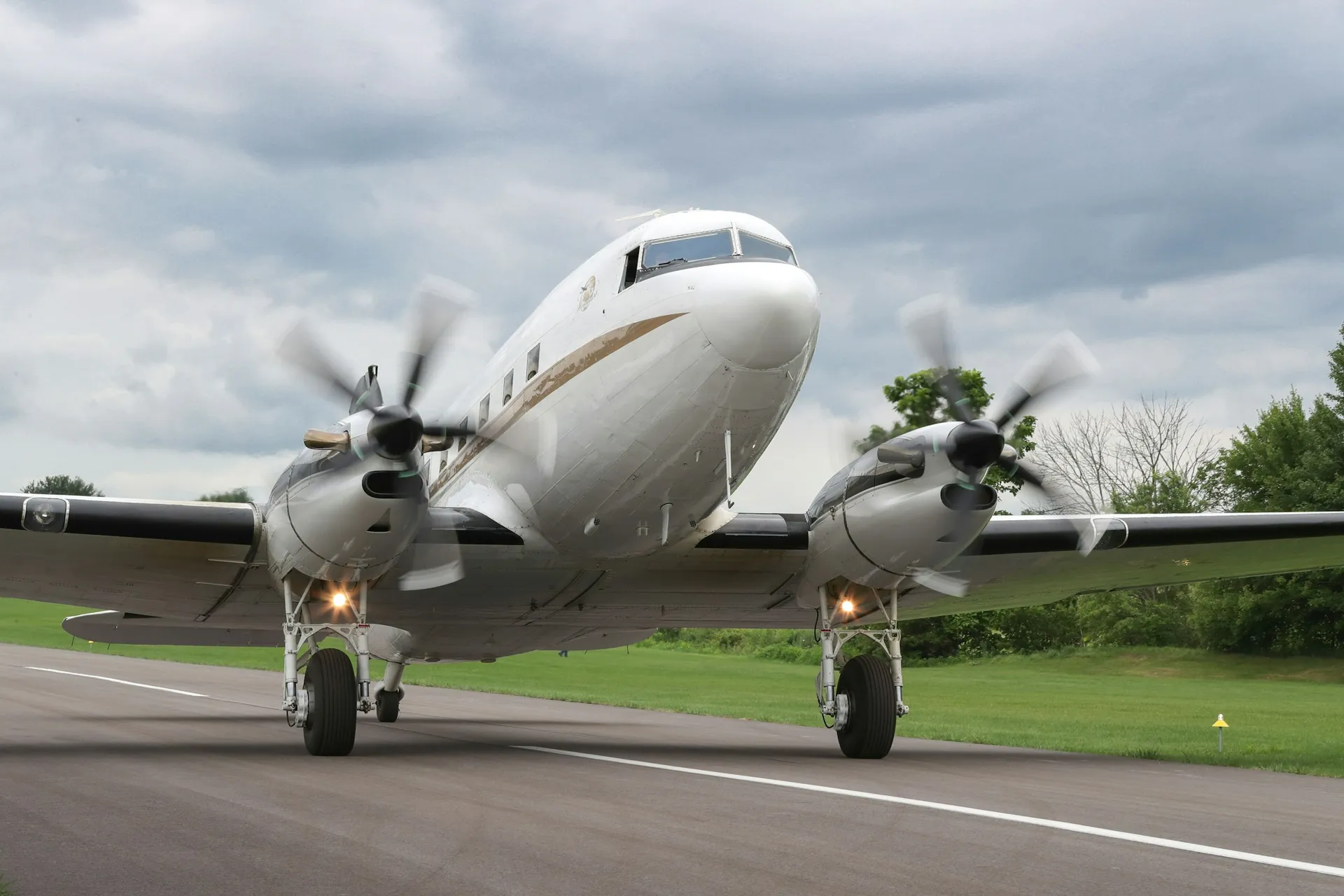 Twin-engine training aircraft on a runway