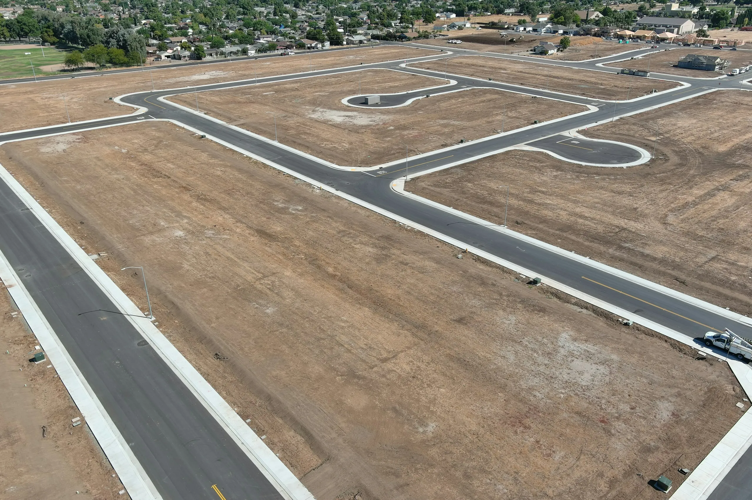 Aerial view of an airport runway and taxiways