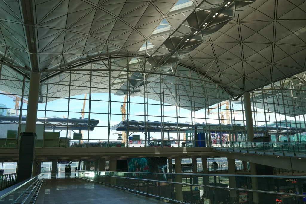 Airport departure hall with a glass wall